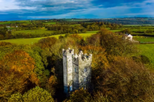 Victorian Gothic Drummond Tower rising above Irish pasture