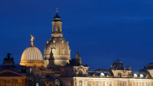 Baroque skyline of Dresden Neumarkt—Frauenkirche dome and palace façades glowing in sunset light