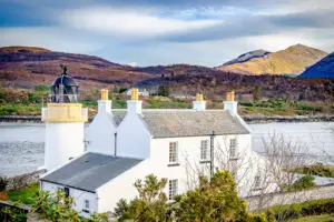 White Corran Lighthouse facing Loch Linnhe with Highland mountains behind