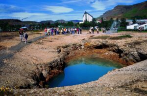 Steam plumes and greenhouse roofs in Hveragerdi, Iceland